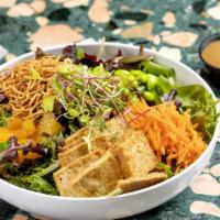 Asian Salad · Mixed greens, seared sesame tofu, carrots, edamame, mandarin oranges, Chinese noodles with o...