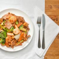 Happy Family · Jumbo shrimp, sliced beef, chicken and pork served with mixed vegetable in delicious brown s...