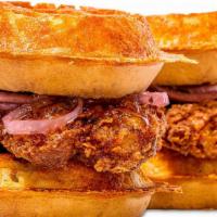 Chicken And Waffles Sandwich · Fried chicken, cheddar cheese, pickled onions, pepper jelly whiskey maple syrup.