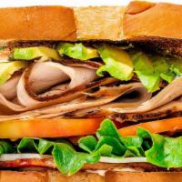 Turkey Blt Sandwich · Turkey breast, lettuce, bacon, tomato, avocado and provolone cheese.