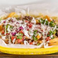 Asada Fries · French fries loaded with steak, mozzarella, pico, cotija and sour cream.