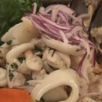 Ceviche Mixto · Mix it up with a combination of fresh swai fish, calamari and shrimp marinated in lime juice...