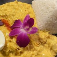 Aji De Gallina · Creamy shredded chicken,yellow pepper, eggs,bread,cheese,spieces,rice,steam potatoes