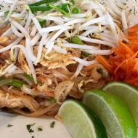 Chicken Pad Thai · Rice noodles with sliced white meat chicken, egg, peanuts, carrots, scallion, bean sprouts, ...
