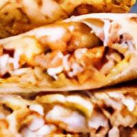 Bbq Chicken Quesadilla · One large flour tortilla, stuffed with grilled chicken, cheese, BBQ sauce, crispy onions, an...