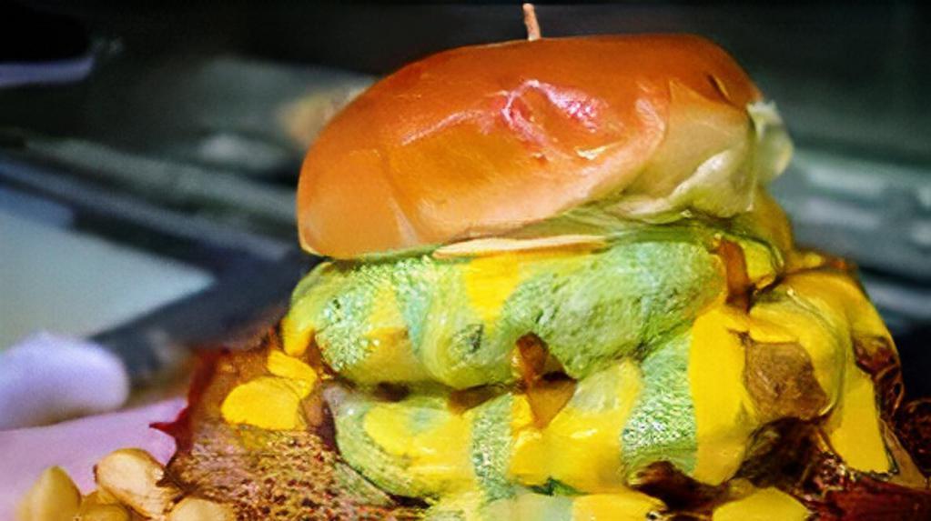Mac And Cheeseburger · Comes with fries has cheese sauce has salsa Verde (cilantro green sauce).