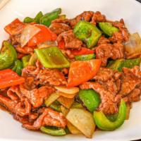 Pepper Steak · Qt. Sliced beef sauteed with green pepper, red peppers, onion, and brown sauce.