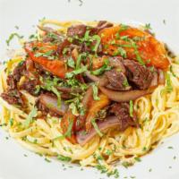 Pasta A La Huancaina Con Lomo · Peruvian style with huancaina sauce served with stir fry steak.