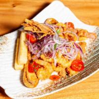 Jalea · Deep fried shrimp, calamari, mussels and fish, fried yucca, criolla and rocoto cream.