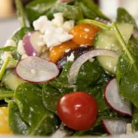 Greek Spinach Salad · Baby spinach, olives, red onion, cucumber, heirloom tomatoes, feta, and lemon oregano vinaig...