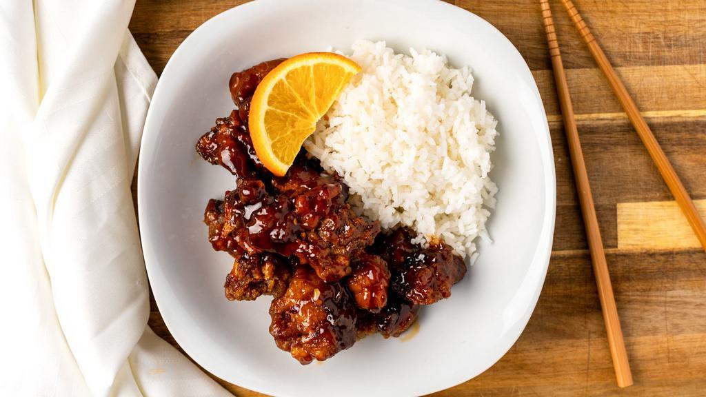 Orange Chicken · Chicken breast lightly breaded with homemade orange sauce.