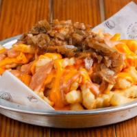 Tfts Crinkle Fries · Cheese, grilled onion and thousand island sauce