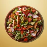 Fattoush Feast Salad (Small) · Pita chips, cucumbers, tomatoes, parsley, onion, mint, and house dressing. Served with pita ...