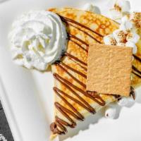 Aventura Crepe · Nutella, forced marshmallows, graham crackers, and semi-sweet chocolate.