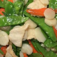 Chicken With Snow Peas · Served with white rice.