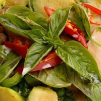 Green Curry · Mild spicy green curry paste with coconut milk,green and red bell peppers, bamboo shoots and...