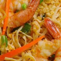 Pad Thai Noodles · A most favorable thai flat rice noodle sauteed with egg, bean sprouts and scallions topped w...