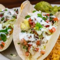 Fish Or Shrimp Tacos · Two corn or flour tortilla tacos filled with fish or diced shrimp. Topped with lettuce, Pico...