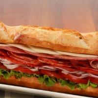 Italian Sub · Lettuce, Tomato, ham, pepperoni, salami and Mozzarella cheese. Italian Dressing on the side