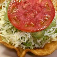 Guacamole Salad · Lettuce, guacamole, cheese, and tomato.