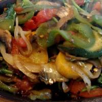 Fajitas Vegetarian · Cooked fresh tomatoes, green peppers, broccoli, cauliflower, yellow squash, zucchini, onions...