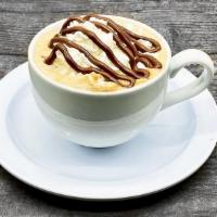 Café Nutella® · Delicious Nutella® steamed in with milk poured over a shot of Espresso and topped with Whipp...