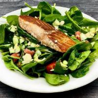 Spinach Salad With Grilled Salmon · Fresh Spinach, Diced Tomatoes, Cucumbers, and Sliced Almonds topped with a perfectly Grilled...