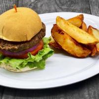 Classic Burger · 1/2 lb. Burger with Lettuce, Tomato, and Onion on a Grilled Kaiser Bun. Served with Homemade...
