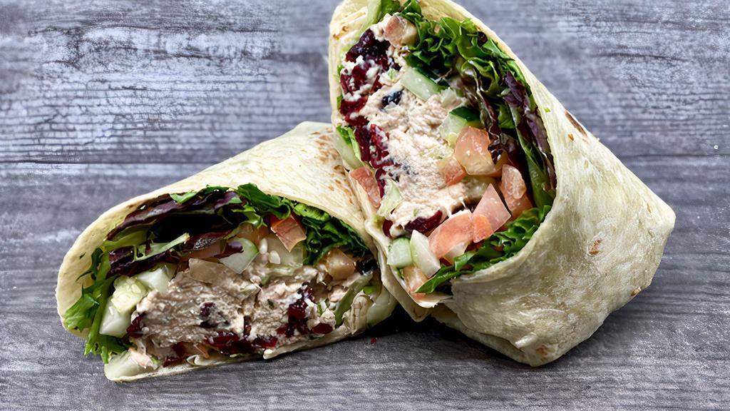 Cranberry Tuna Wrap · All White Tuna Salad, Sun-dried Cranberries, Tomatoes, Cucumbers, and Baby Greens
