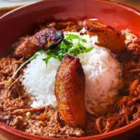 Ropa Vieja · Shredded beef with peppers,red onion,garlic and red wine,serverd  with white rice and sweet ...