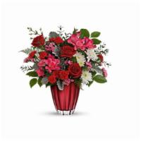 Love Me  · The belle of the ball! Arranged in a ruby red vase, this romantic bouquet of rich red roses ...