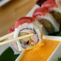 Miami Heat Roll · Shrimp tempura, cream cheese, crab salad, topped with baked salmon, spicy mayo and topped wi...