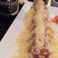 Boris Roll · Fried white fish, avocado, spicy mayo and cream cheese topped with spicy tuna masago, eel sa...