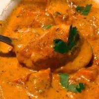 Chicken Tikka Masala · Tender chicken pieces marinated and roasted in a tandoor, cooked in a rich onion and creamy ...