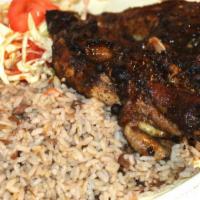 Jamaican Oven Jerk Chicken: Includes Rice, Veggie And Plantains · Side order are not included: 
All sides sold a-la-carte (Example Rice, Plantains and Veggies)