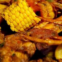 Seafood Boil - Curry Garlic · Curry-Garlic Crab Legs, Lobster, Shrimp, Potatoes, and Corn