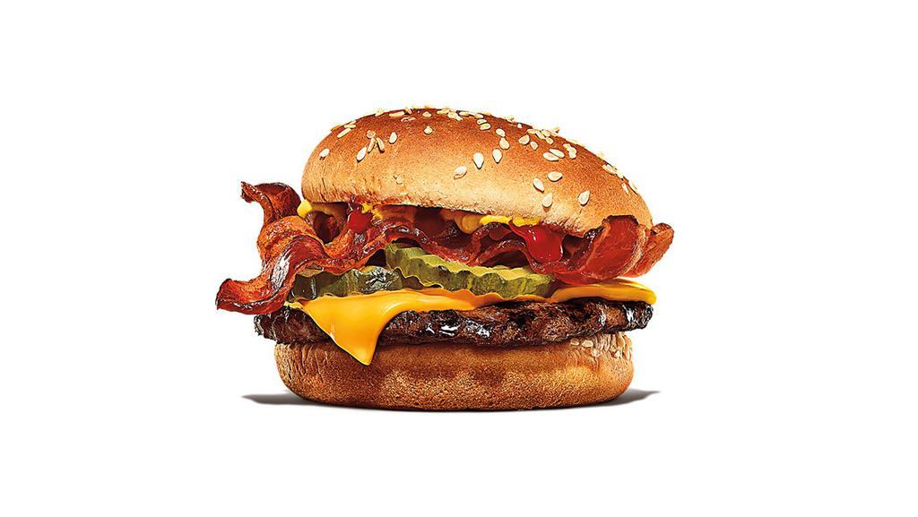 Bacon Cheeseburger · You cant go wrong with our Bacon Cheeseburger, a signature flame-grilledbeef patty topped with smoked bacon and a layer of melted American cheese, crinkle cut pickles, yellow mustard, and ketchup on a toasted sesame seed bun.