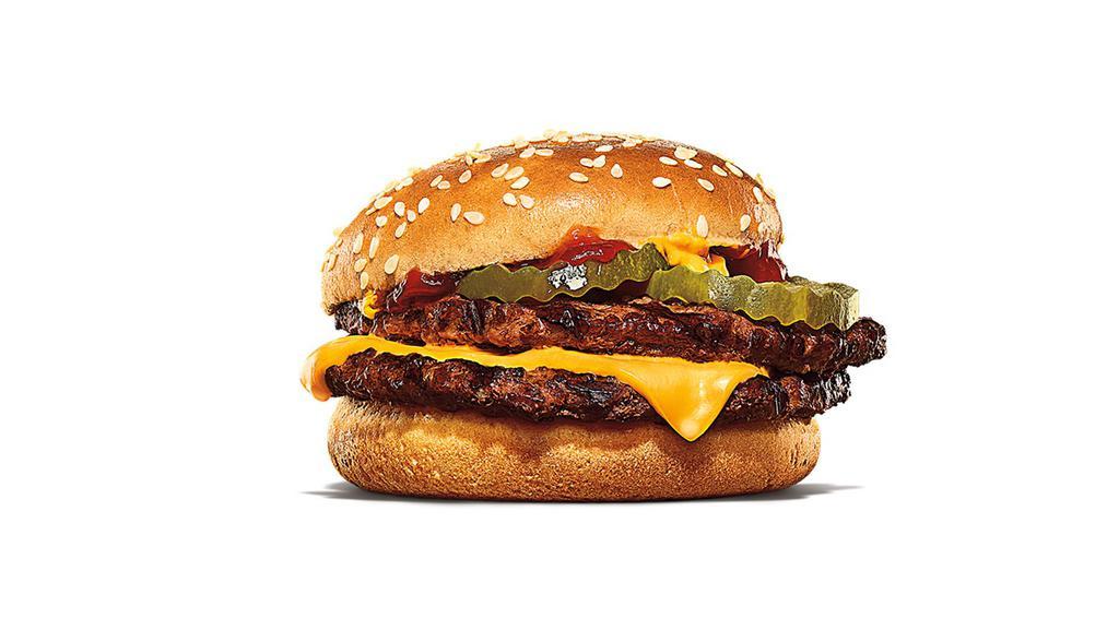 Double Cheeseburger · Two signature flame-grilled beef patties topped with a simple layer of melted American cheese, crinkle cut pickles, yellow mustard and ketchup on a toasted sesame seed bun.