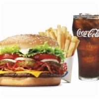 Triple Whopper® With Bacon & Cheese Meal · Our Triple Whopper Sandwich features three ¼ lb* savory flame-grilled beef patties topped wi...