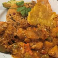 Pollo Guisado · Stewed Chicken with choice of white rice or arroz con gandules/salad/tostones and maduros