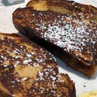 French Toast · Served with butter and syrup.