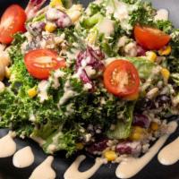 Jinya Quinoa Salad · Baby green, green kate, broccoli, and white quinoa, kidney beans, garbanzo beans tossed with...