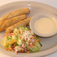 Tacos Fritos De Carne O Pollo · Fried chicken or beef tacos. Served with salad and sour cream.