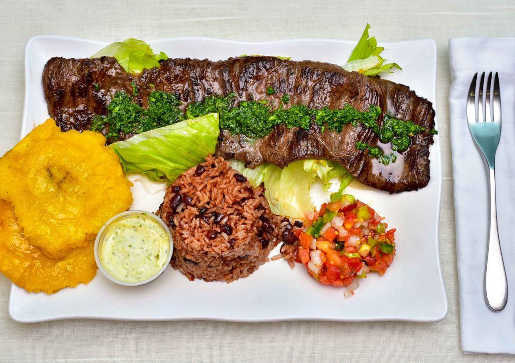 Churrasco Con Camarones · Skirt steak with grilled shrimp. Servidos con dos acompanantes у una tortilla: arroz, casamiento, maduros, ensalada served with two sides and one tortilla: rice, mix rice, sweet plantains, salad.