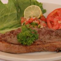 Bistec Rinonada Con Champiñones  · New York strip steak with Mushrooms Sauce. Servidos con dos acompanantes у una tortilla: arr...