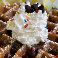 Connect The Dots · Chocolate chip waffle drizzled with chocolate sauce and topped with whipped cream and chocol...