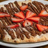 Nutella Pizza · Vegetarian. Additional charges for strawberry or bananas.