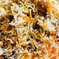 Chicken Biryani · Basmati rice, chicken cooked in special biryani sauce.