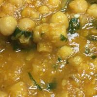 Channa Masala · Garbanzo bean cooked in chef's special sauce.