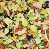 Tex Mex · Crisp Romaine, Sweet Corn, Black Beans, Shredded Mozzarella, Crispy Onions, Ripe Avocado & P...